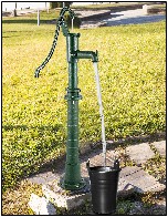 Hand water pump located at homes on the Sherard plantation.